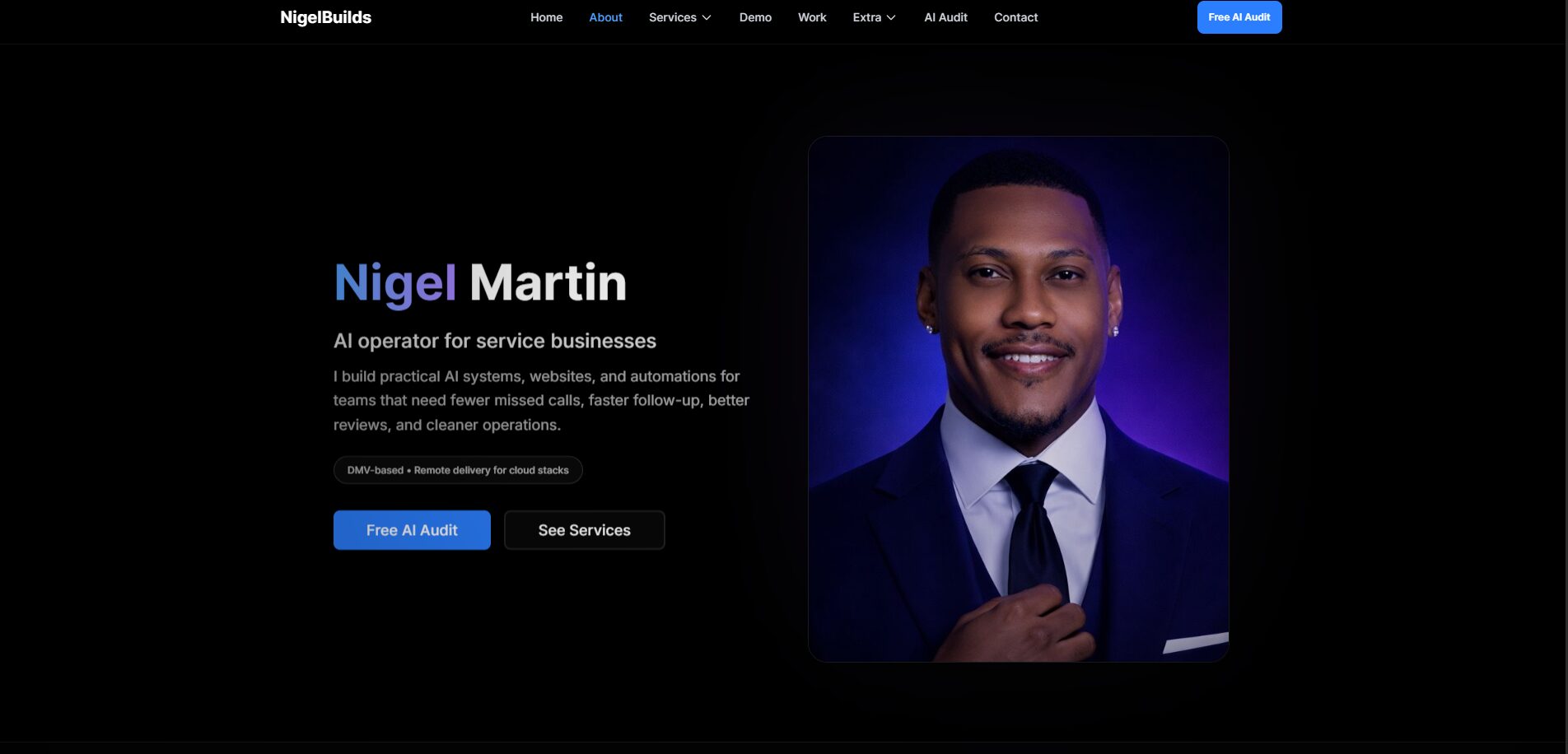 Professional portrait of a man in a suit smiling, with a dark background and blue lighting, on a website homepage.