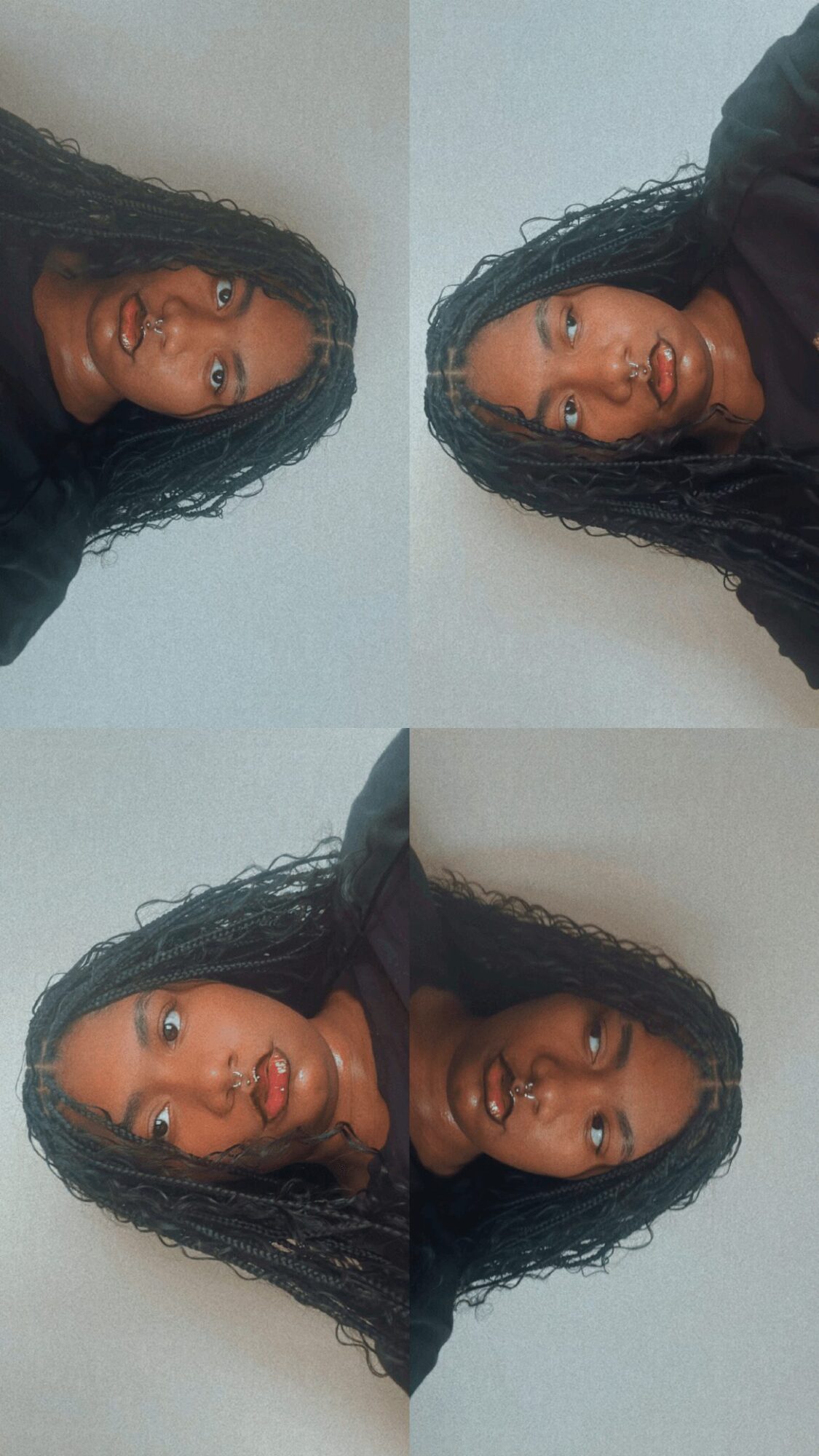 Four images of a woman with long curly hair, wearing a black top, in different poses against a plain wall.