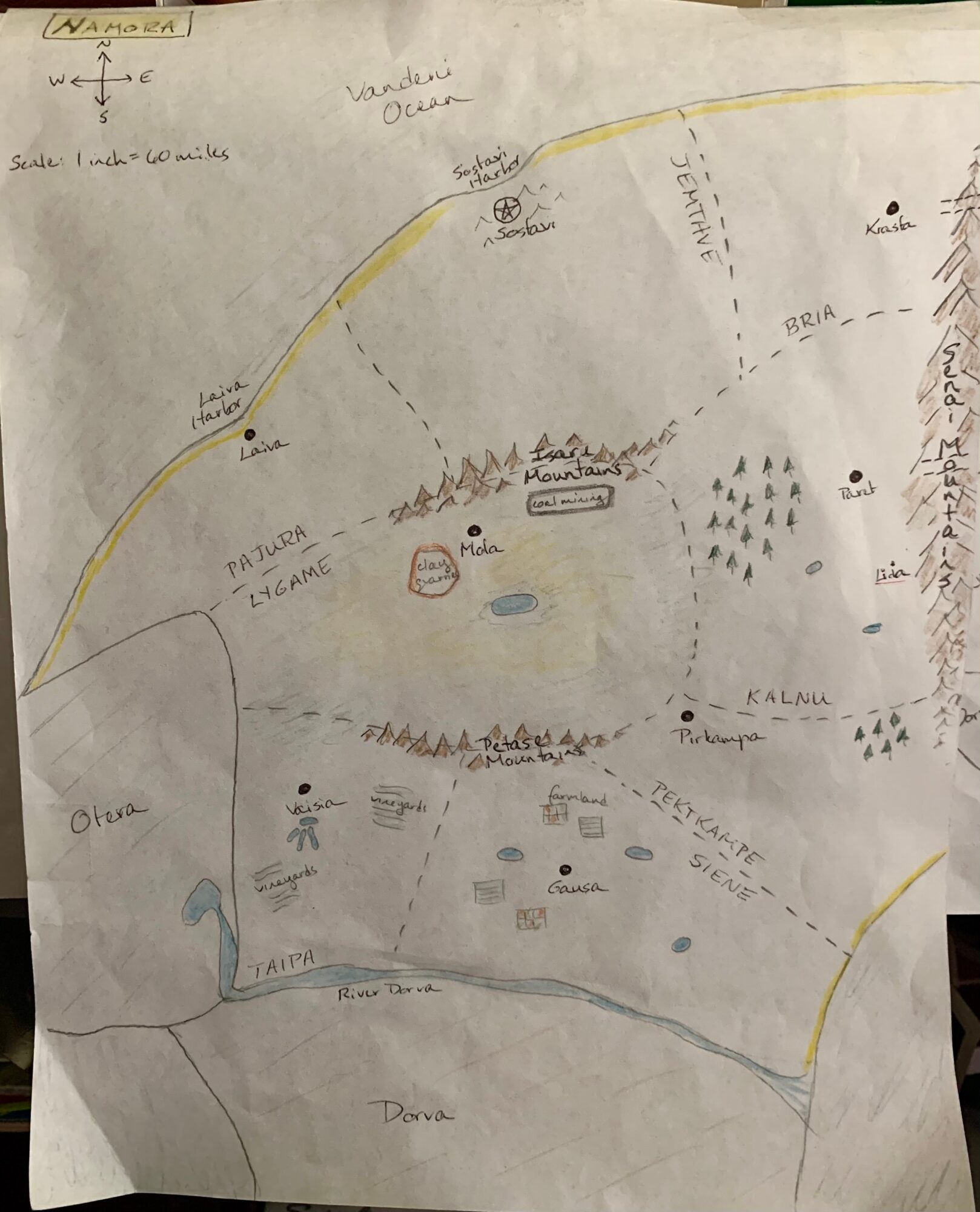 Hand-drawn map with roads, trees, water bodies, and labels in a landscape orientation, showing various locations and features.