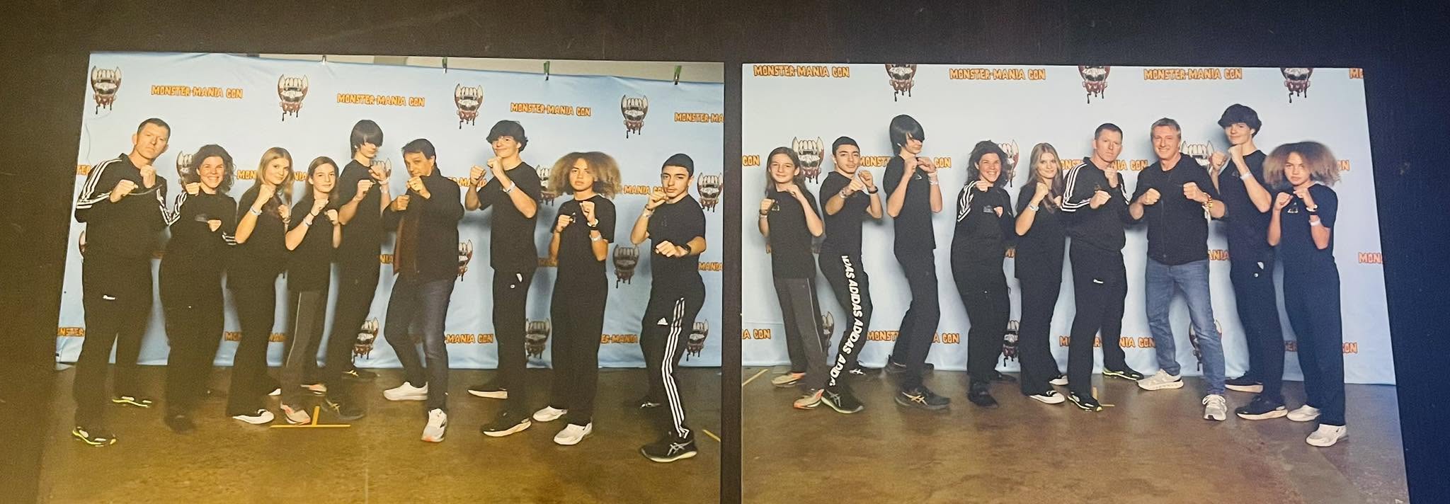 Two groups of people standing together in front of a backdrop, posing for photos, wearing dark clothing.