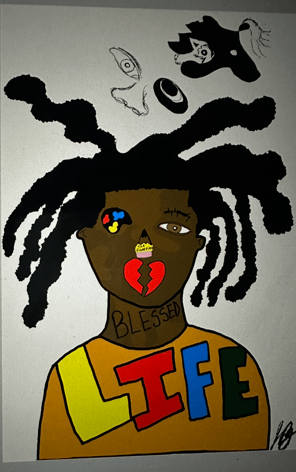 Drawing of a person with large dreadlocks, a broken heart on their face, and colorful letters spelling 'LIFE' on their shirt, with abstract shapes above.